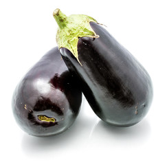 Two whole eggplants (aubergine) isolated on white background
