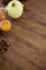 High angle view of apple with egg and spices