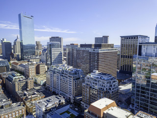 Fototapeta premium Boston, Massachusetts, USA city skyline aerial panorama view with urban buildings midtown 