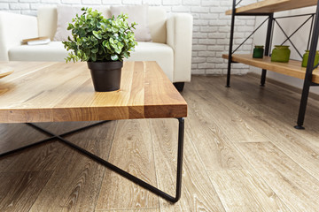 modern wooden table in the loft interior