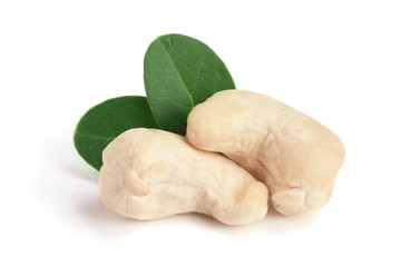 cashew nuts with leaf isolated on white background. macro