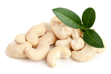 cashew nuts with leaf isolated on white background. macro