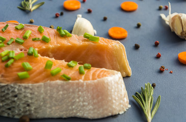 Raw salmon with spice rosemary,black pepper peas,garlic and carrot slice