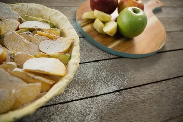 High angle view of apple pie preparation