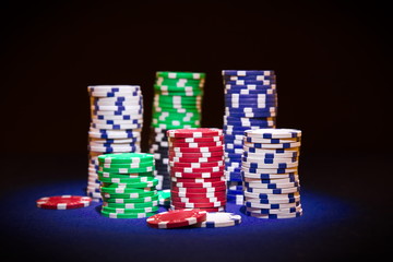 Poker chip on black background