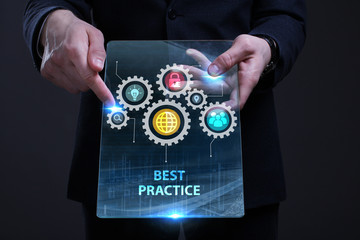 Business, Technology, Internet and network concept. Young businessman working on a virtual screen of the future and sees the inscription: Best practice