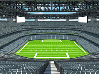 Fototapeta premium Nowoczesny stadion futbolu amerykańskiego z szarymi siedzeniami