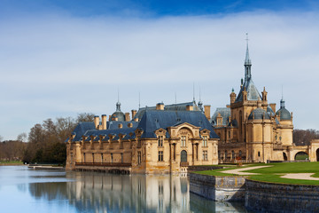 Fairytale Chateau de Chantilly at sunny day - obrazy, fototapety, plakaty