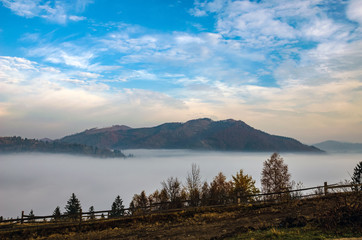 Foggy morning in the Ukrainian Carpathian Mountains in the autumn season