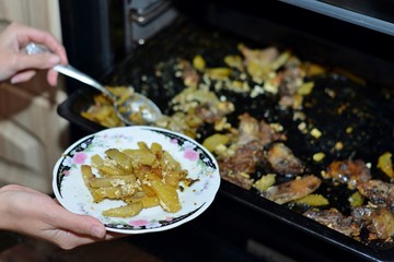 Fried potatoes in the oven