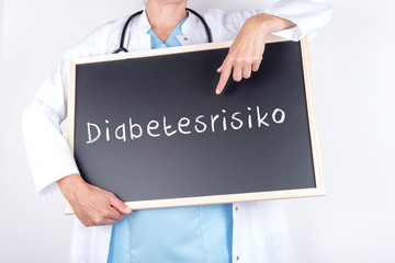 Arzt mit Schild Diabetes
