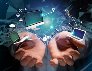 Computer and devices displayed on a futuristic interface with interantional network - Multimedia and technology concept