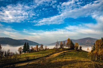 Foggy morning in the Ukrainian Carpathian Mountains in the autumn season