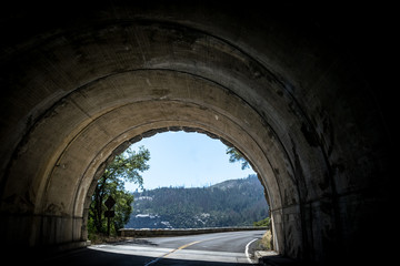 Fototapeta na wymiar Tunnel on a mountain road. Travel to Yosemite National Park