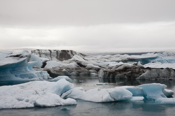 Panoramic Jokulsarlon, Typical Icelandic landscape, a wild nature of seals and icebergs, rocks and water.