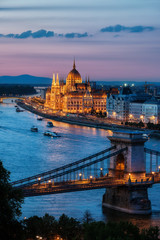 Naklejka na ściany i meble Budapest City at Dusk with Chain Bridge and Hungarian Parliament Building