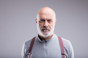 Fototapeta premium portrait of a serious old man