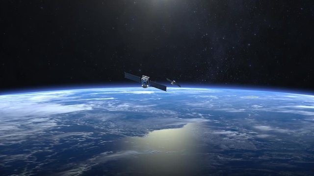 Two satellites scan and monitor the Earth. Satellites flying from camera far away quickly. The earth rotates slowly. 4K.