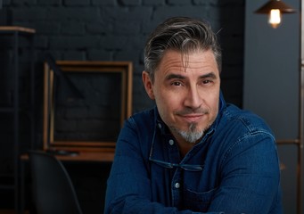 Portrait of older man with gray hair