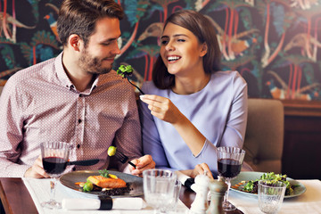 Romantic couple dating in restaurant