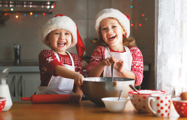 happy children bake christmas cookies