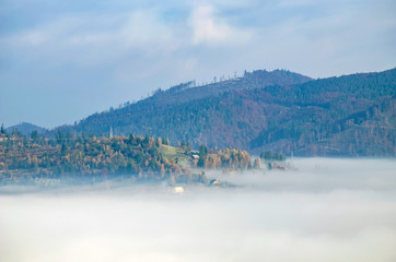 Foggy morning in the Ukrainian Carpathian Mountains in the autumn season