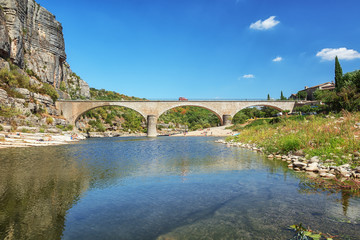 The bridge over the River Ardeche near the old village Balazuc in the Ardeche region of France