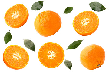 Fototapeta na wymiar Ripe tangerines and leaves on a white background, isolated.