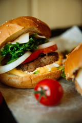 Sandwich hamburger with juicy burgers, cheese and mix of cabbage. Top view