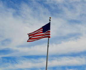 American flag against blue sky