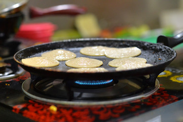 preparing meal on stove 