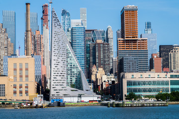 Panoramic photo of Manhattan skyline, skyscrappers, buildings.