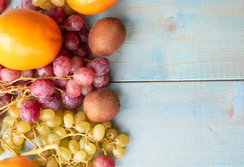 Juicy fruit on a wooden background