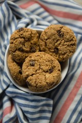 Close up of cookies in bowl on napkin