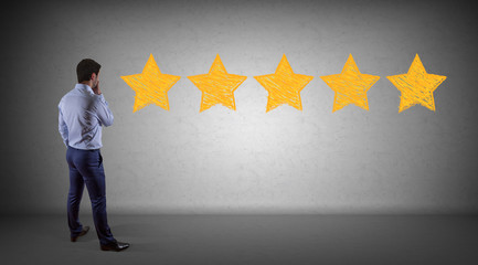 Businessman watching raking stars on a wall 3D rendering