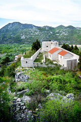 Fototapeta na wymiar View from above on the fortress of Besac in Montenegro.