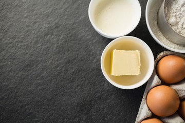 Overhead view of butter in bowl by ingredients
