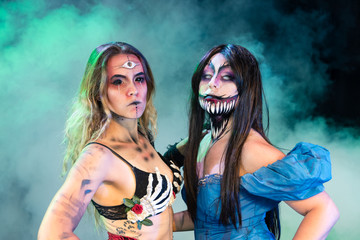 What Lies Beneath Female Model with custom special effects makeup on a stage with theatrical lighting. Halloween and horror themed