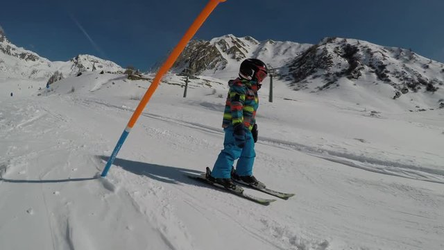 Little boy skiing.
Little boy enjoying skiing. Child learning to ski. Stabilized footage. Slow motion.
