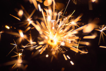 The bright sparks on a dark background