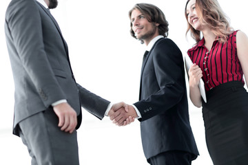 Young businessman shaking hands after agree to collaborate.