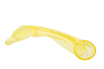 Used yellow condom isolated on white background