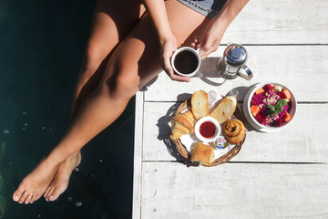 Breakfast and coffee next to the pool
