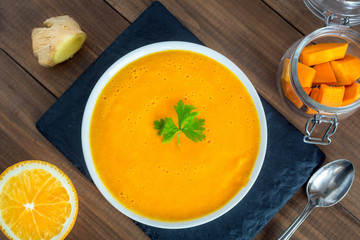 Creamy pumpkin soup with vegetables and spices.