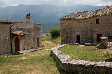 Ancient restored houses in an abandoned mountain village, Central Italy 