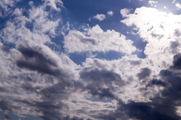 bright blue sky with clouds and sun. cirrocumulus, background, weather.