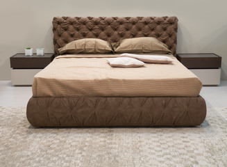 Brown double bed