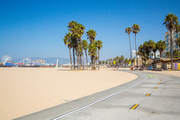 Beautiful morning sunrise lights at the Venice beach in Los Angeles. Bicycle lane by the beach. © Aerial Film Studio