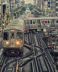 Train on elevated tracks within buildings at the Loop, Chicago City Center - Dark Cross Processing...
