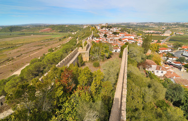 Óbidos -   Medieval old fortified city in Portugal with well-preserved castle and walls.
